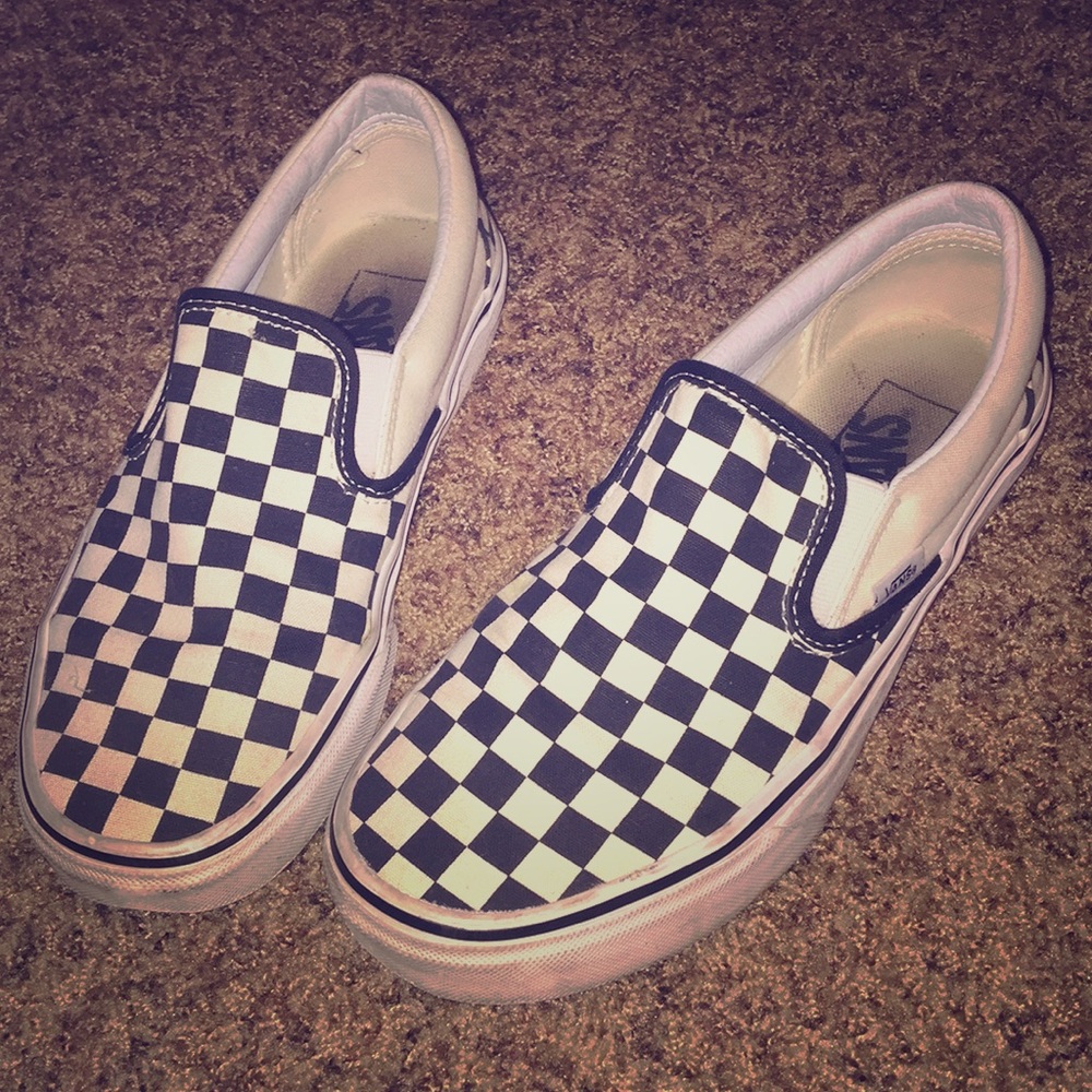 Black and white checkered slip on vans